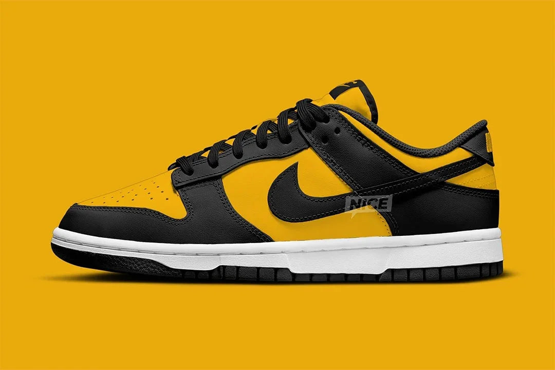Nike sb dunk low top black gold