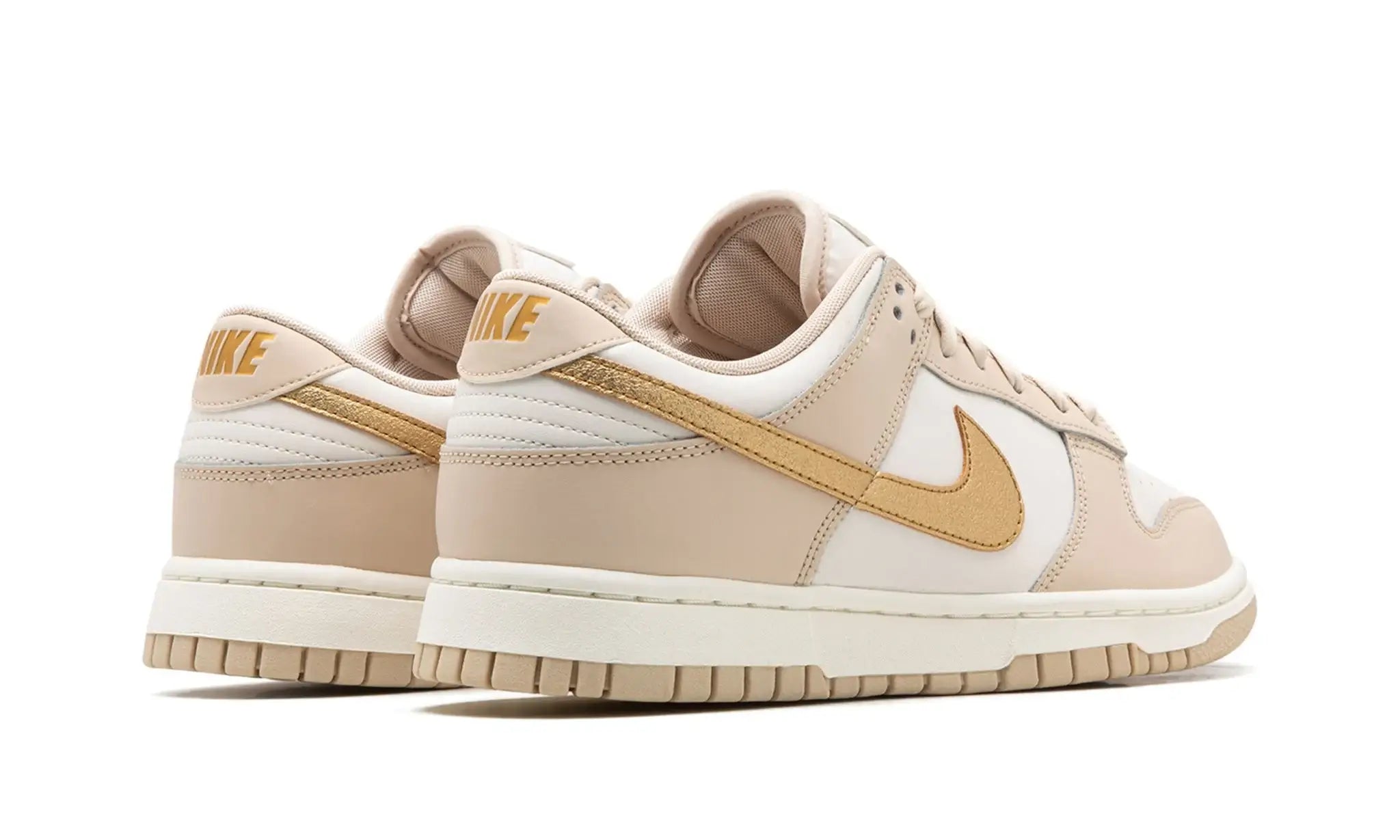 Nike sneakers online gold swoosh